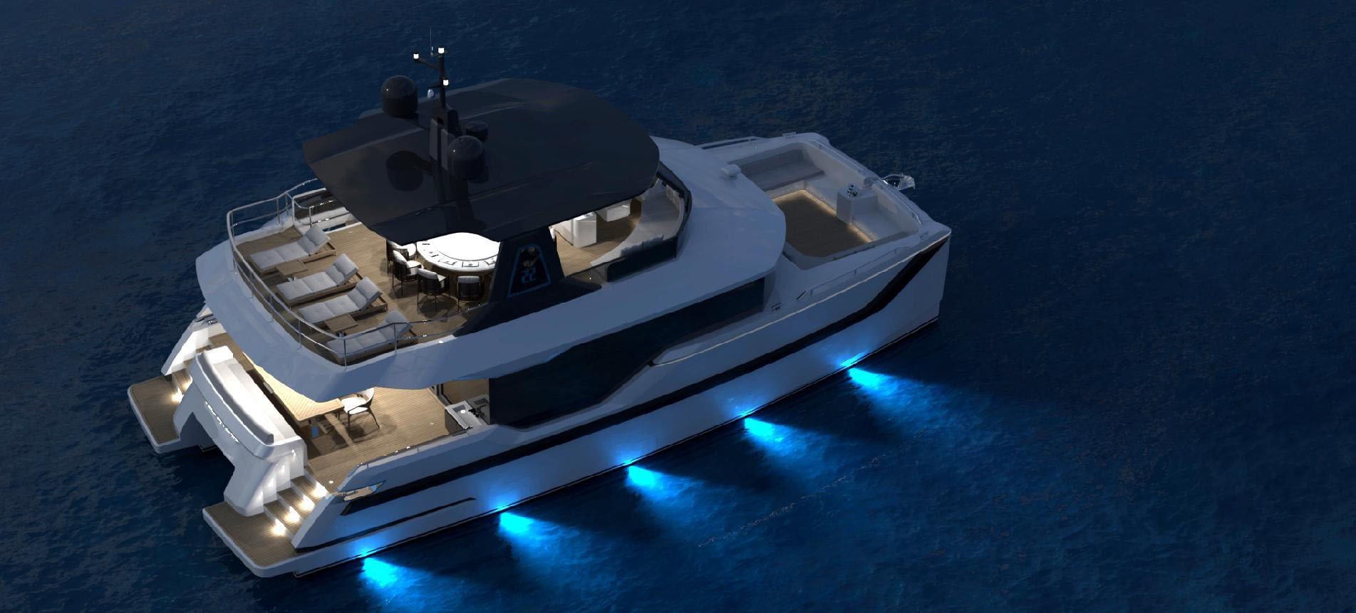OBLUE 55 at anchor at night with underwater lighting